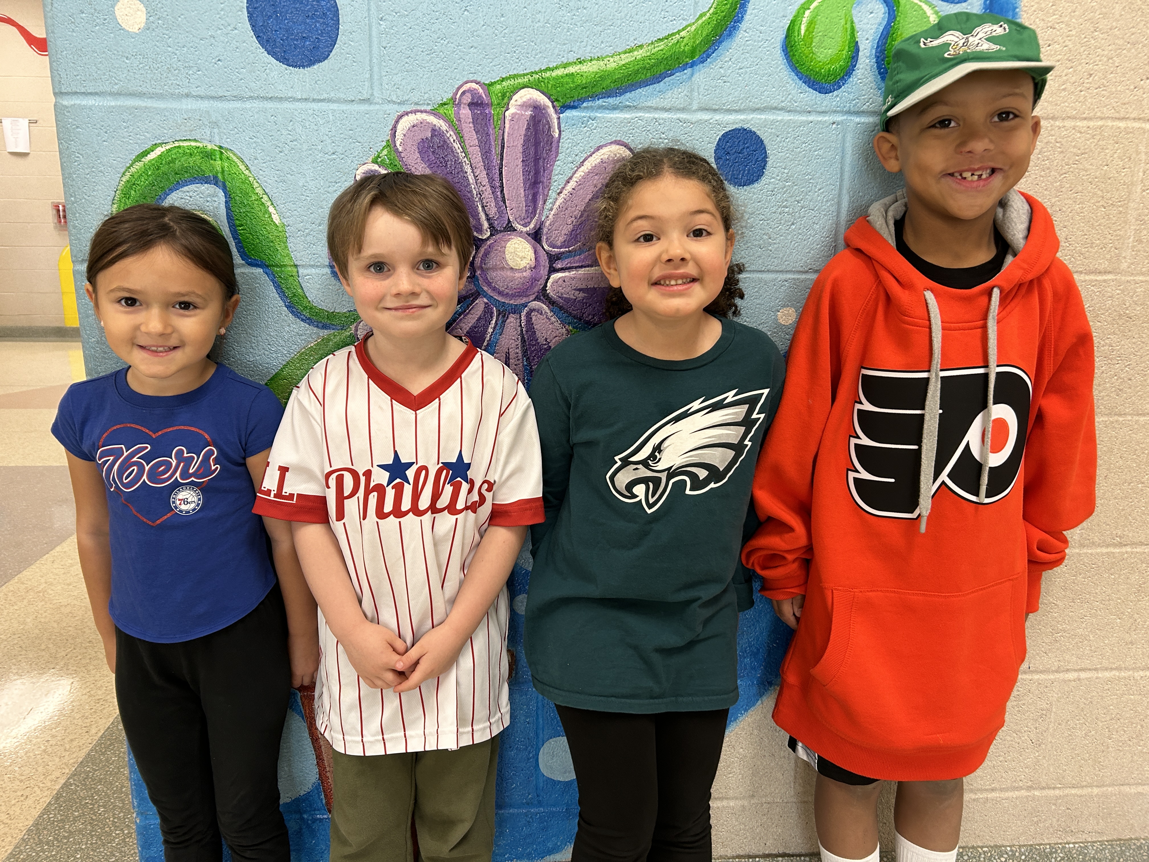 kids in philly sports team shirts