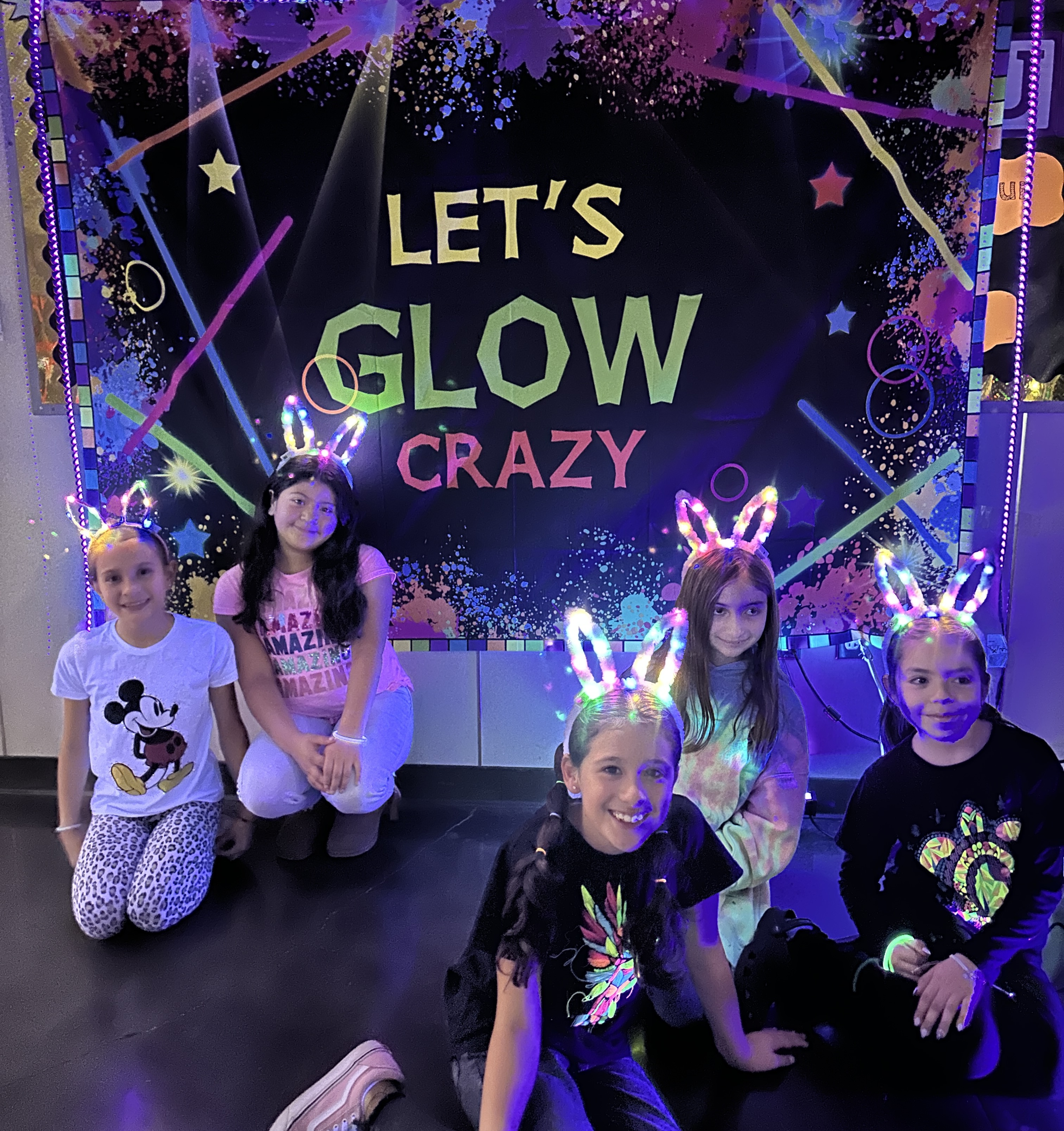 Students glow party dance.