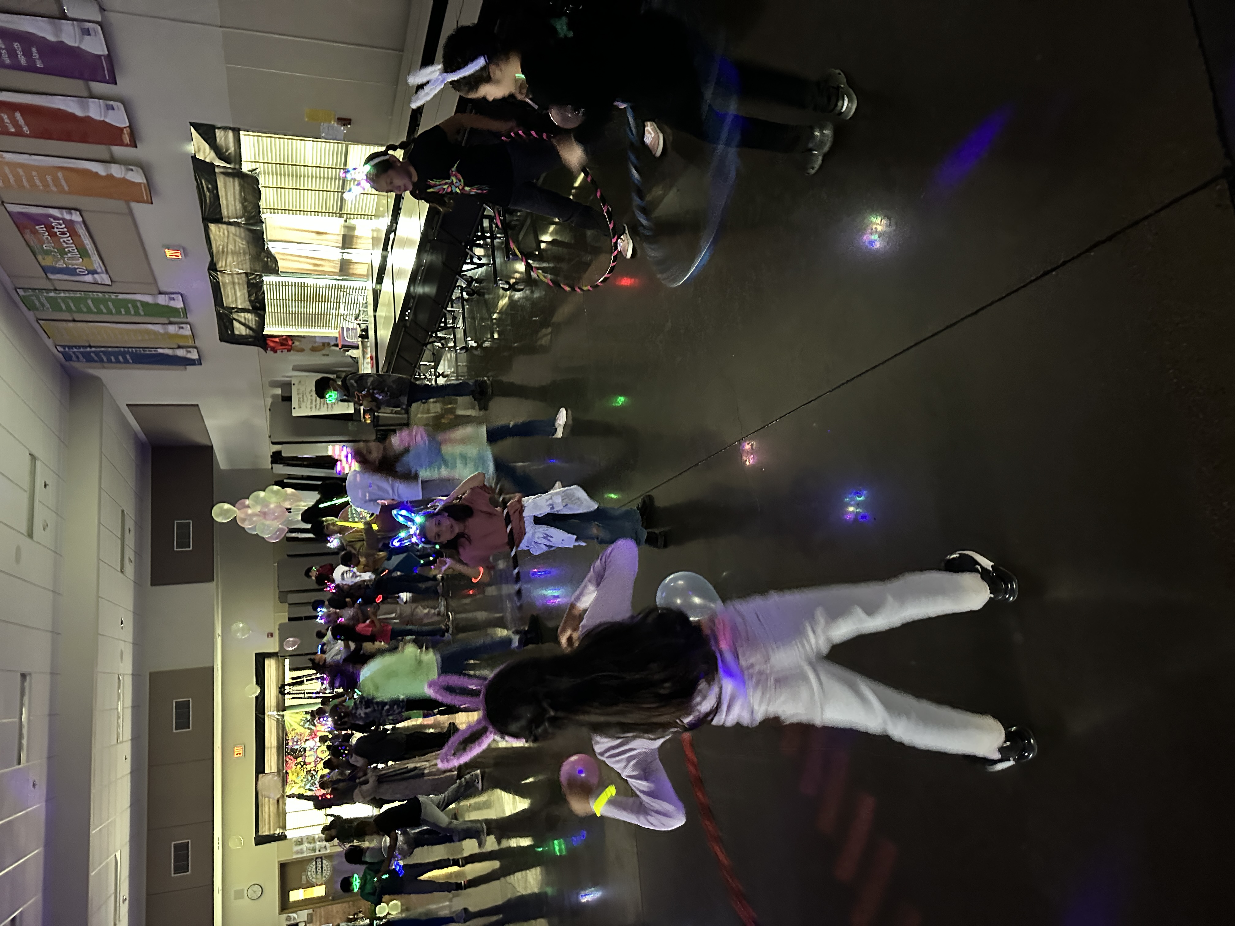 Students glow party dance.