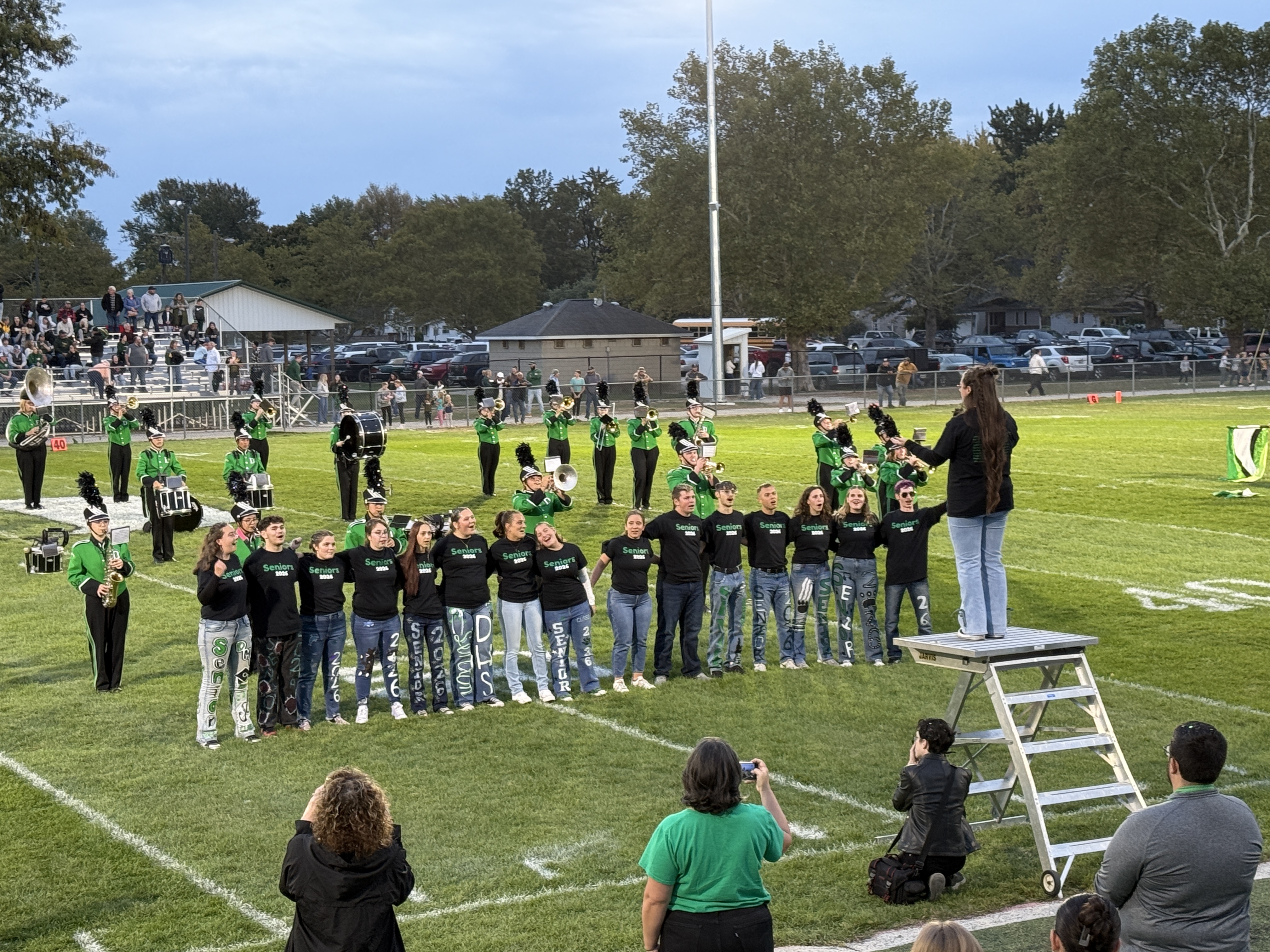 Senior band members in their final home game on the field