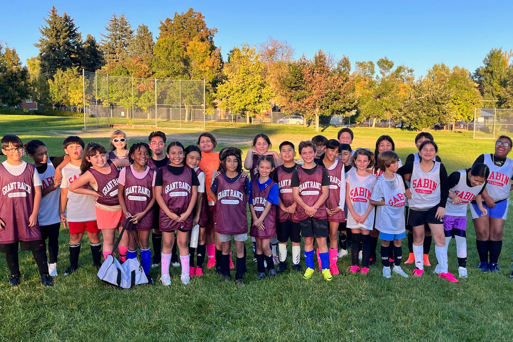Group photo of Grant Ranch and Sabin's soccer teams.