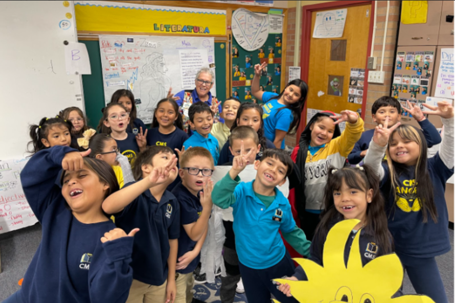 Volunteer with students 