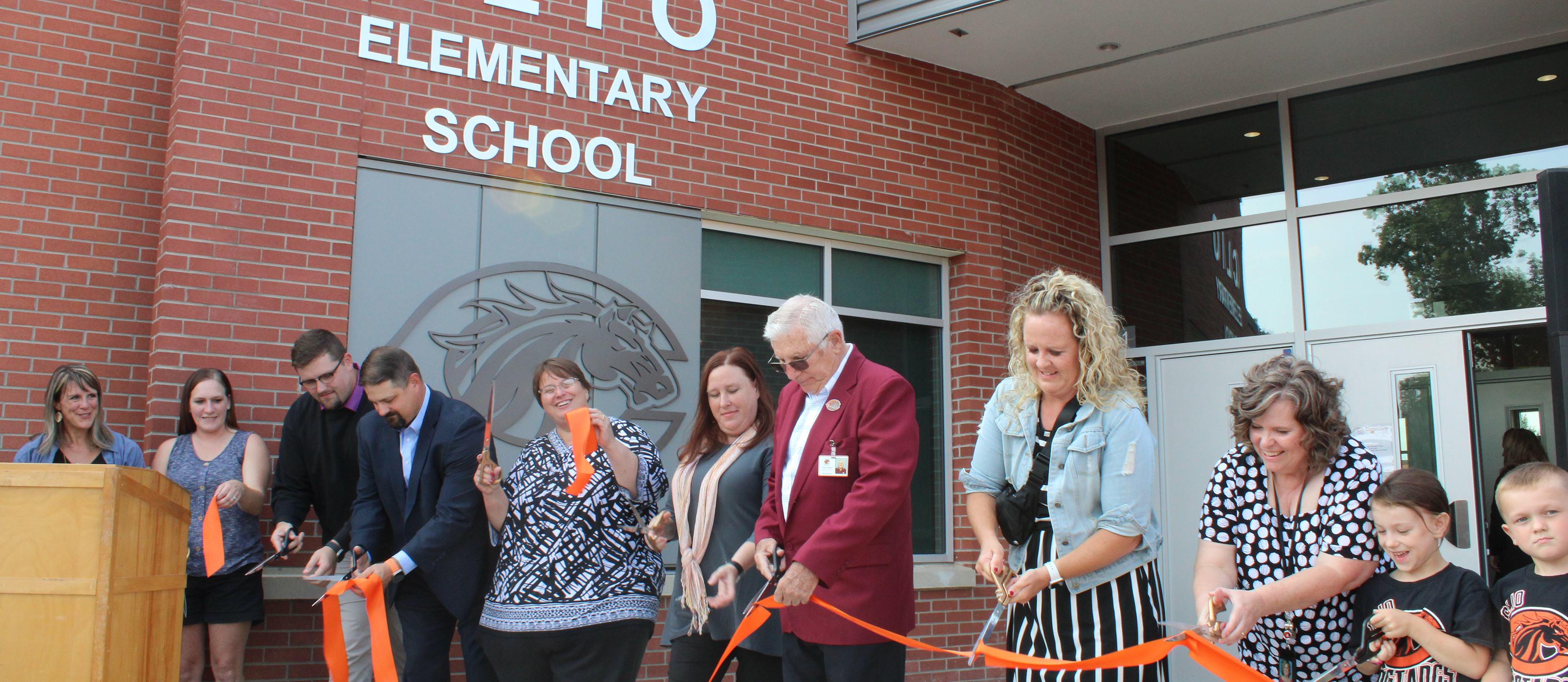 Photo of ribbon cutting ceremony to open Clio Elementary