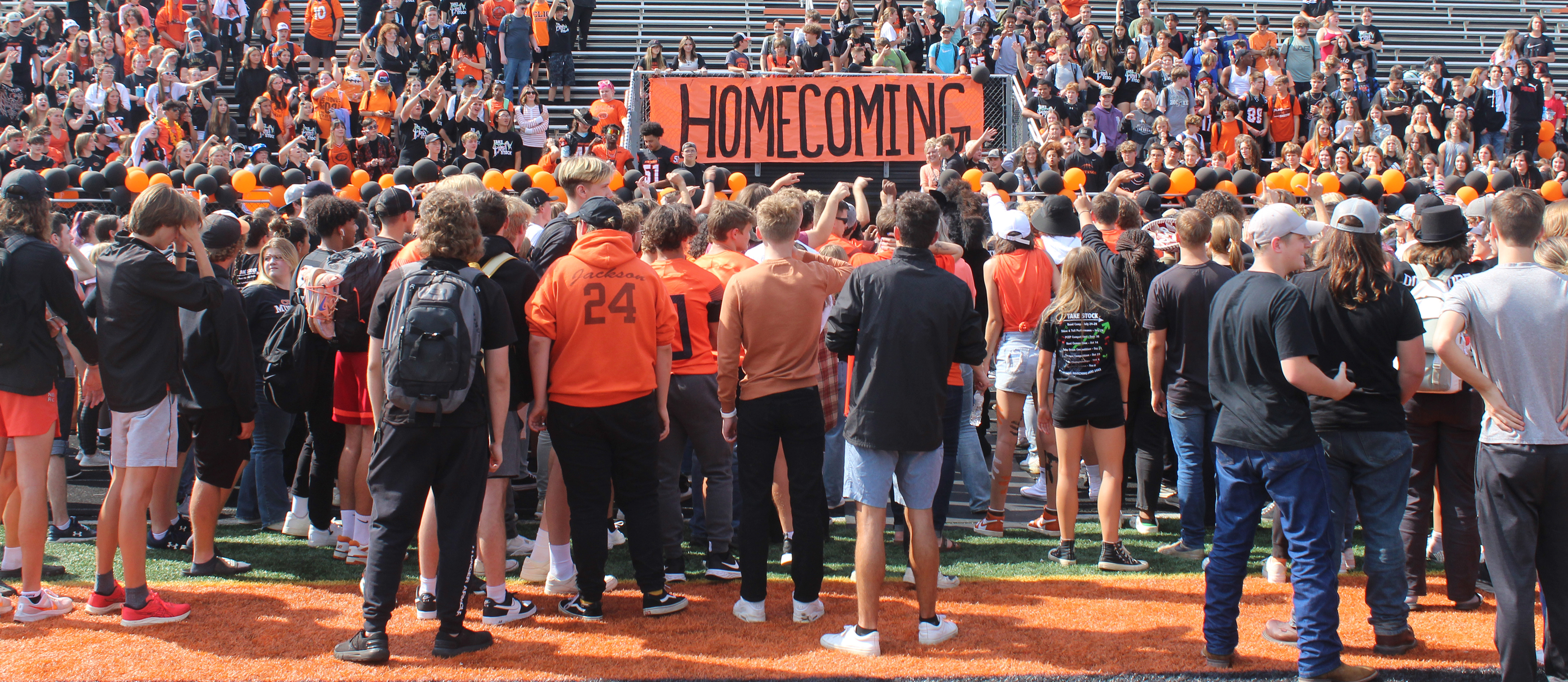 Photo of students at Pride Stadium in Homecoming assembly