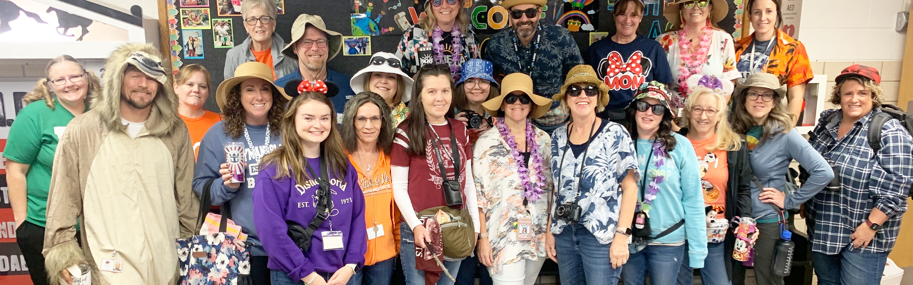 Group photo of CIS staff in costume and  ready for Halloween