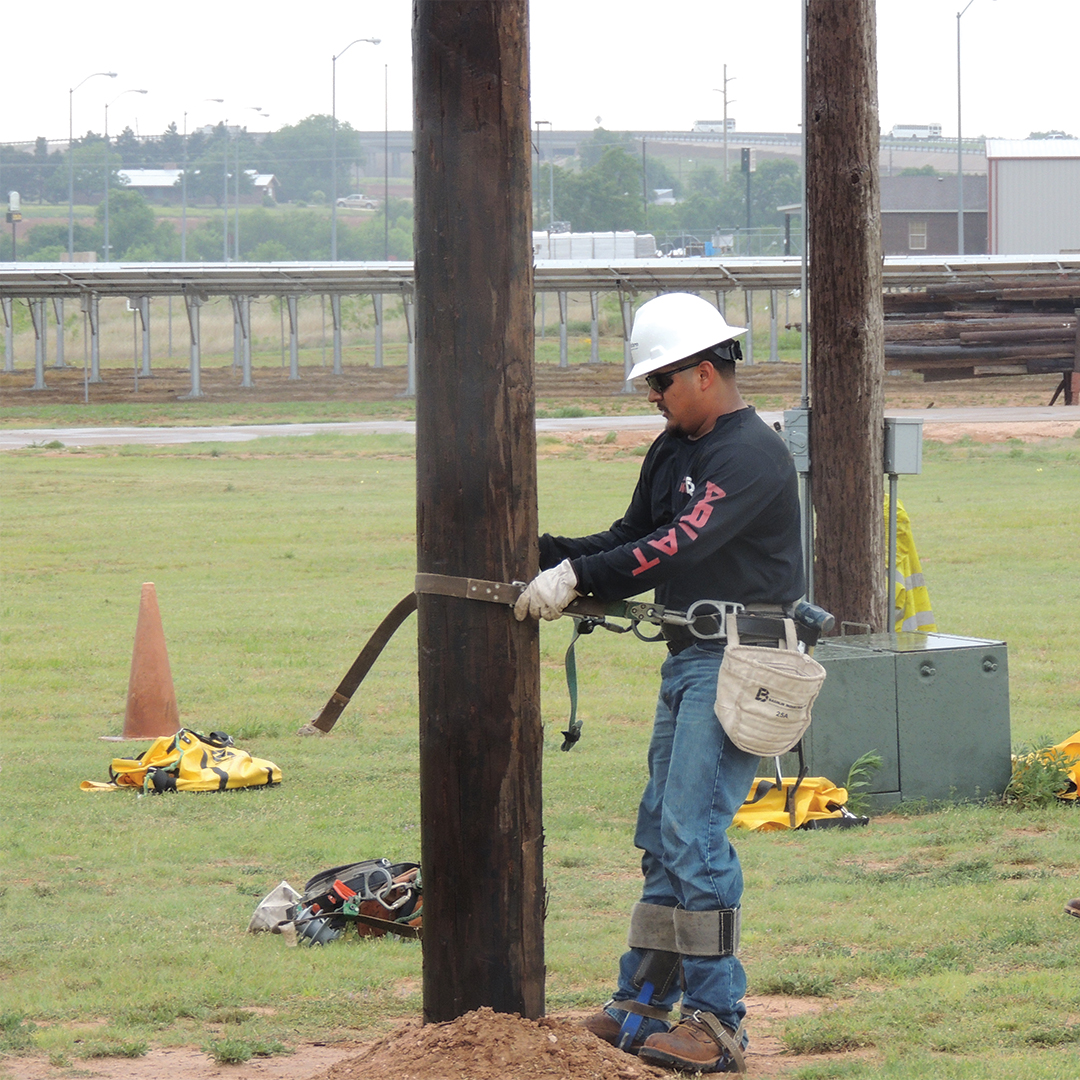 Lineworker getting ready to climb