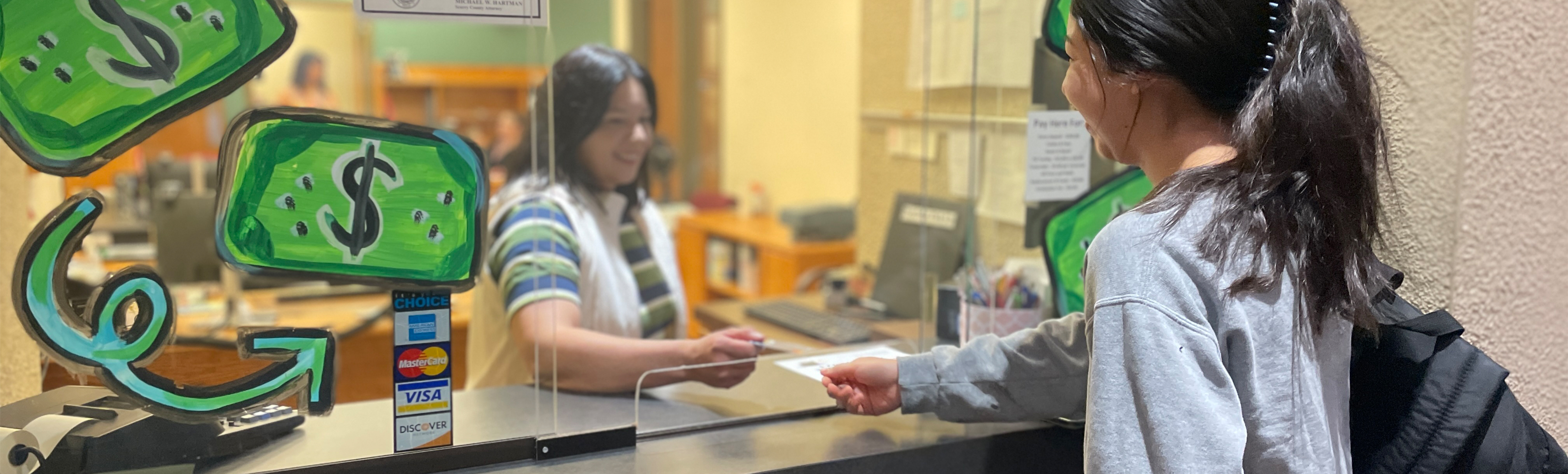 Student paying tuition
