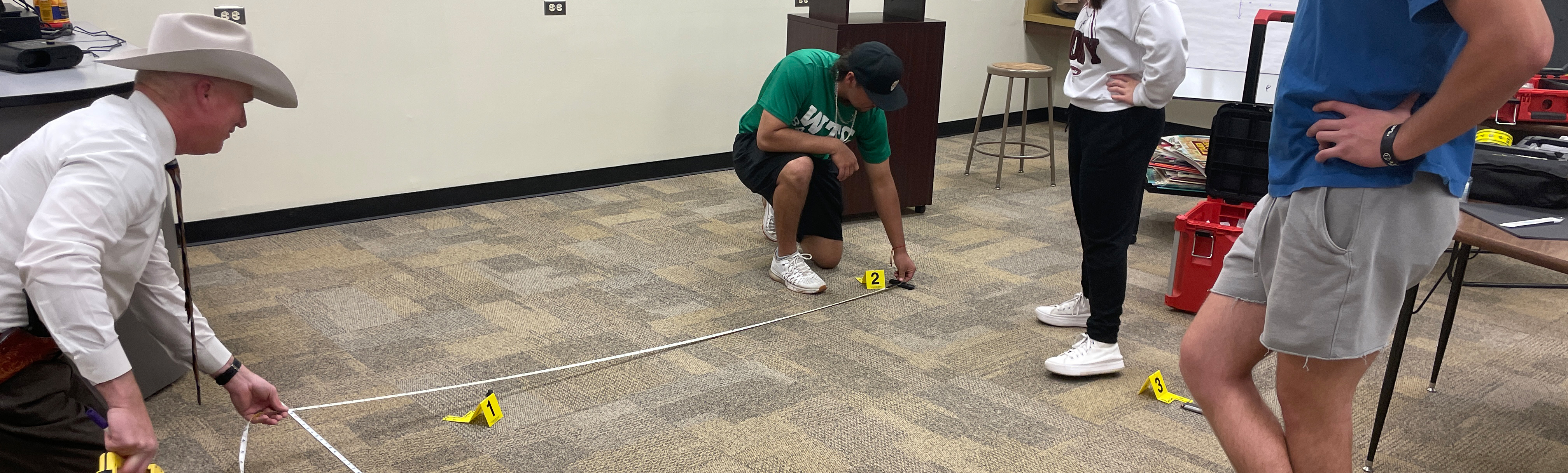 Students measuring distance between numbers