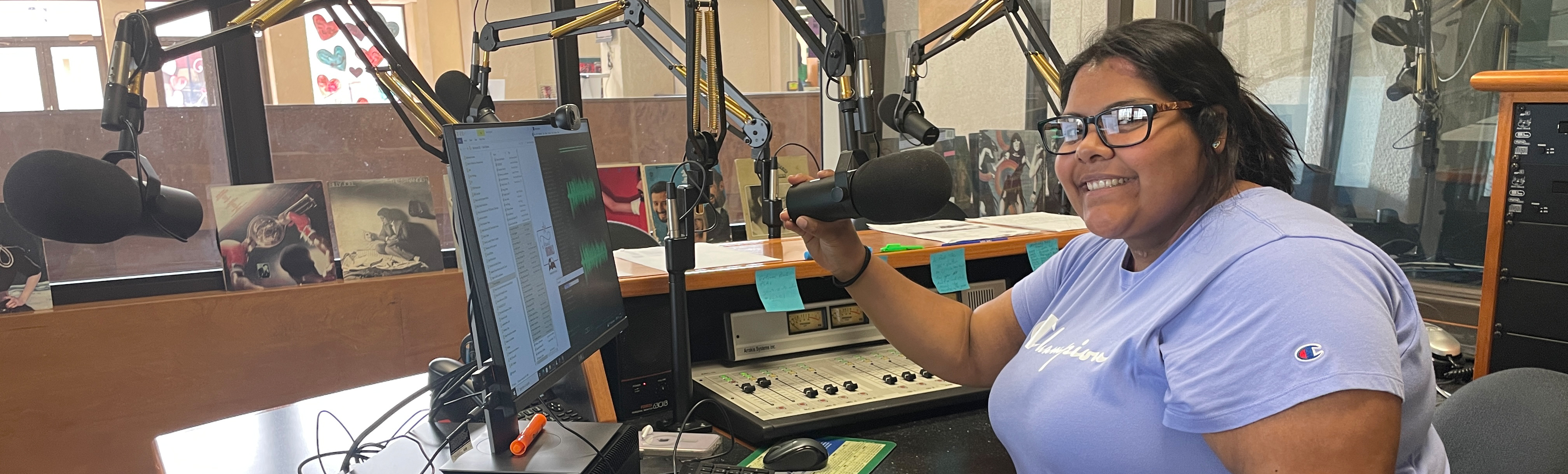 Student speaking into microphone