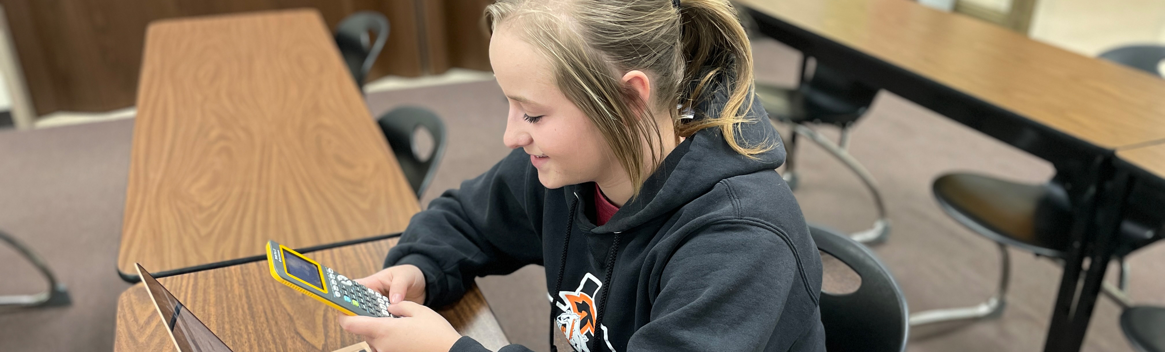 Student using calculator