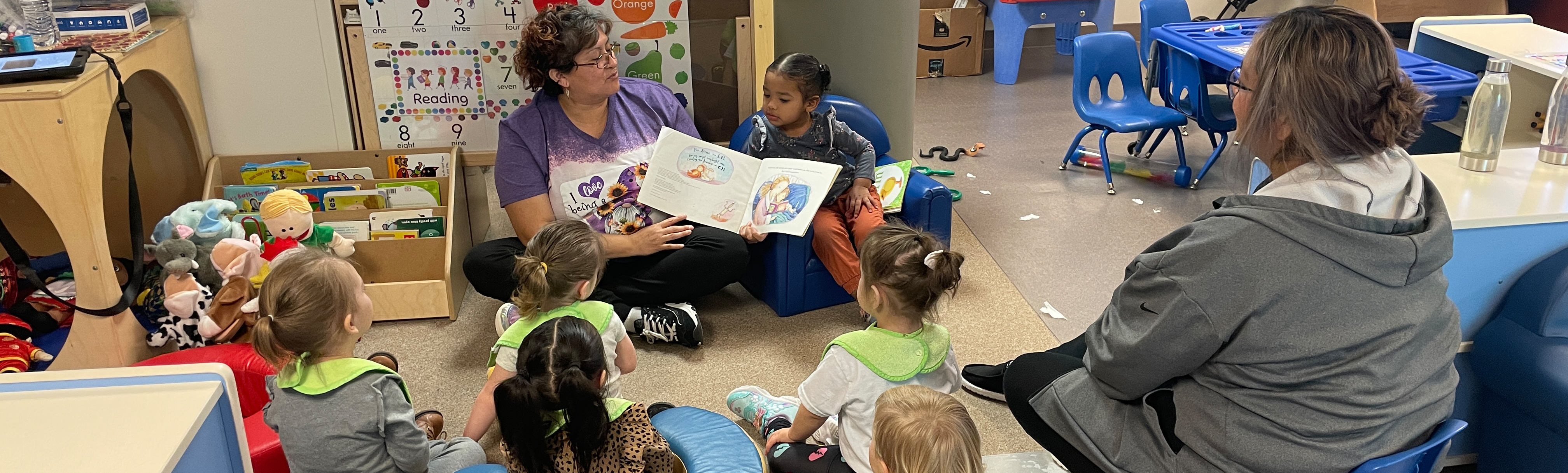Teacher reading to kids