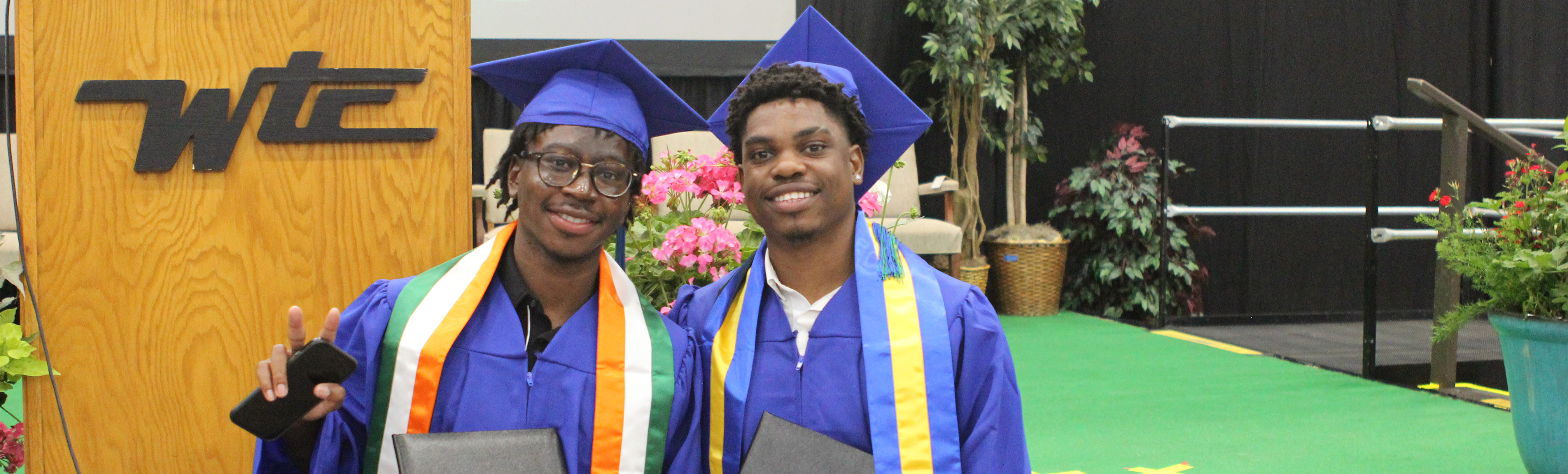 2 students at graduation