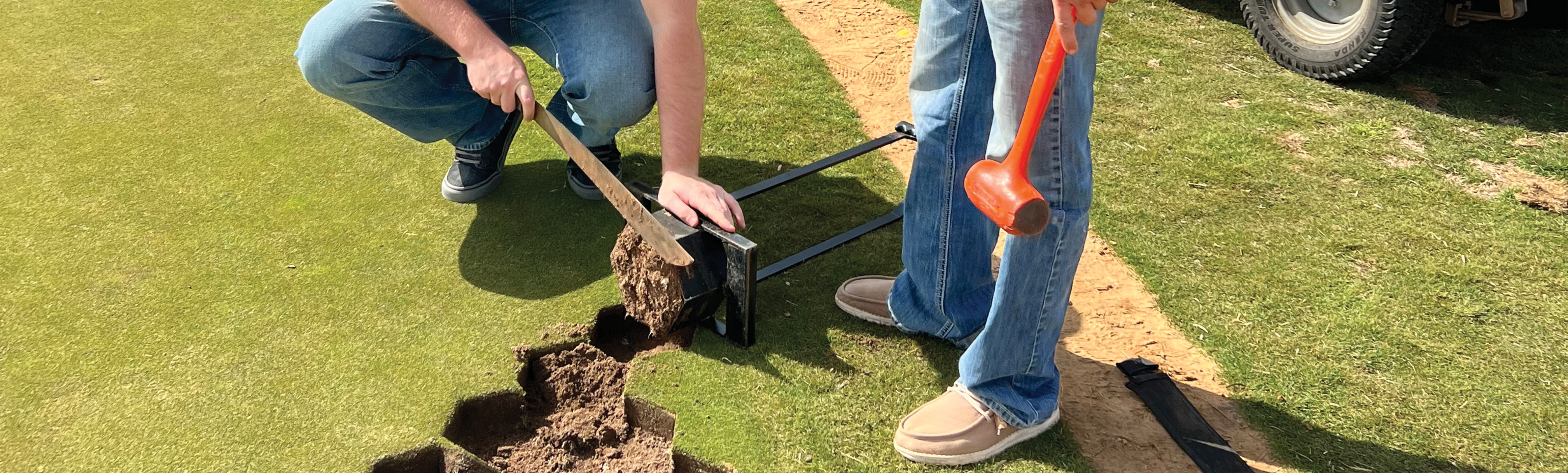 Students cutting golf course
