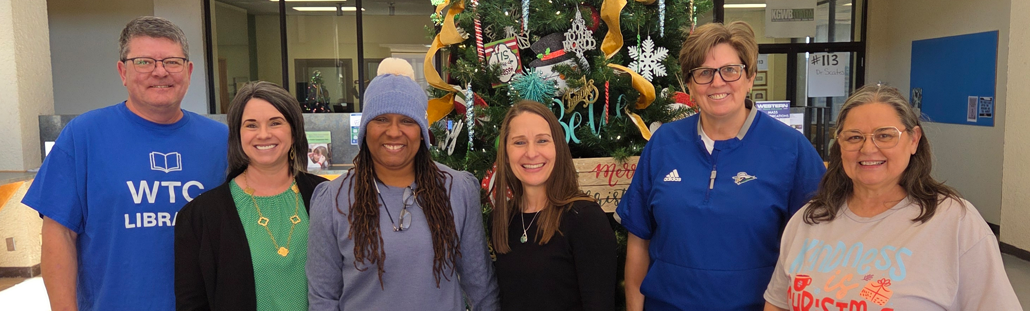 Dr. Sharp with Director of Library Services, Jimmy Fancher, Assistant Vice President for Student Services, Melissa Perryman, Assistant Track & Field Coach, Trinity Williams, Athletic Director, Tammy Davis, and Compliance and Purchasing Officer, Darla Wiggins