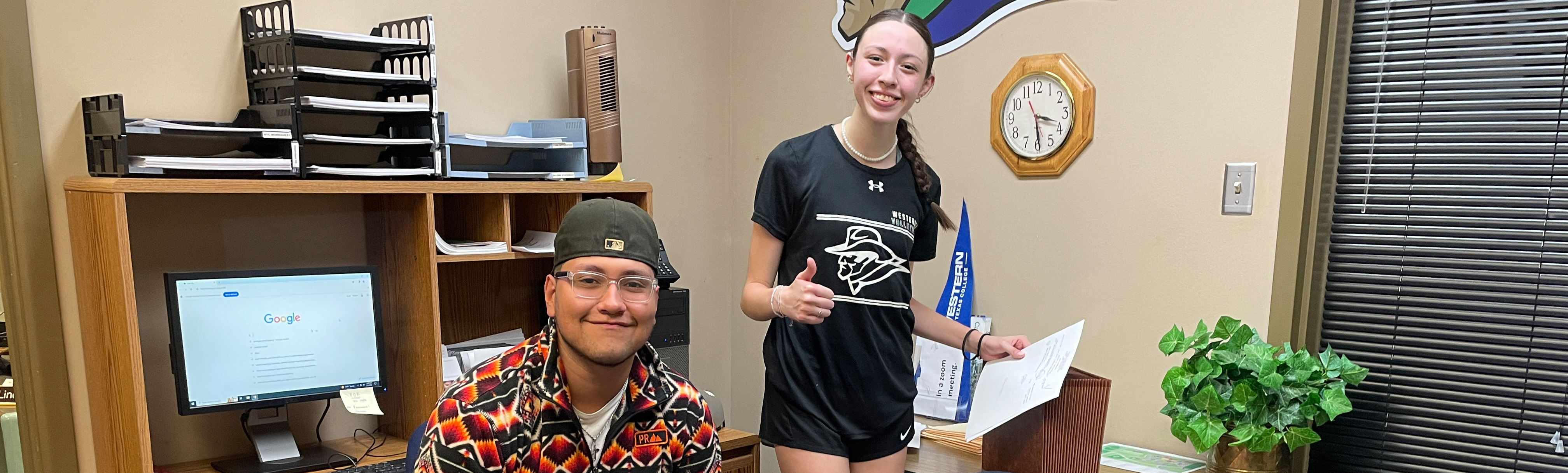 Students working in the Financial Aid office