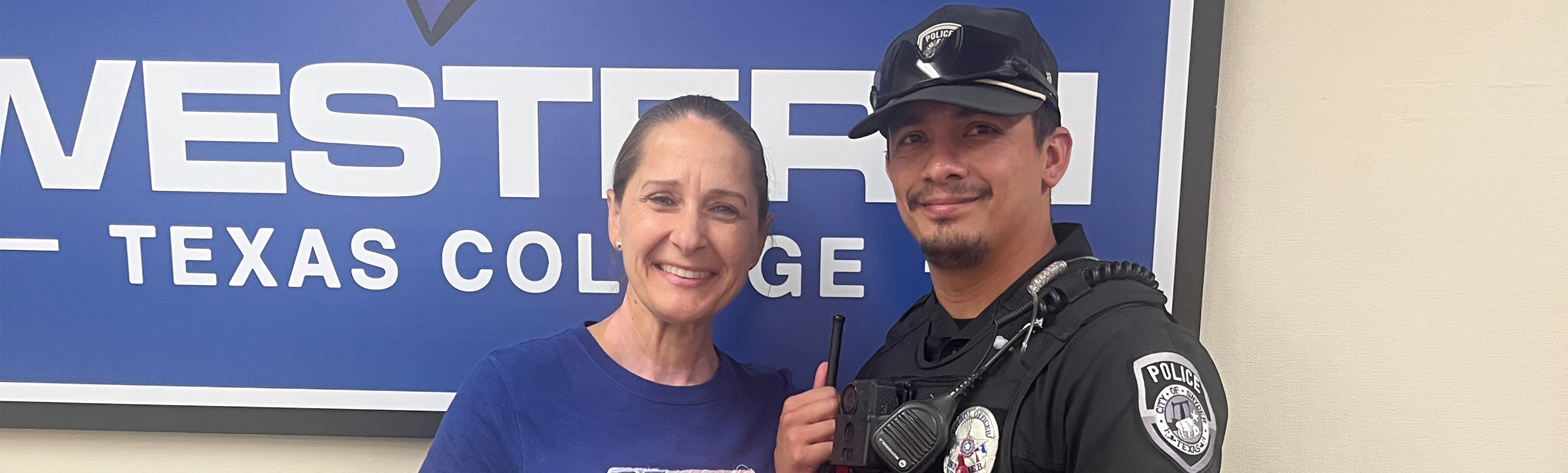 Dr. Laurie Sharp with Police Officer Silva