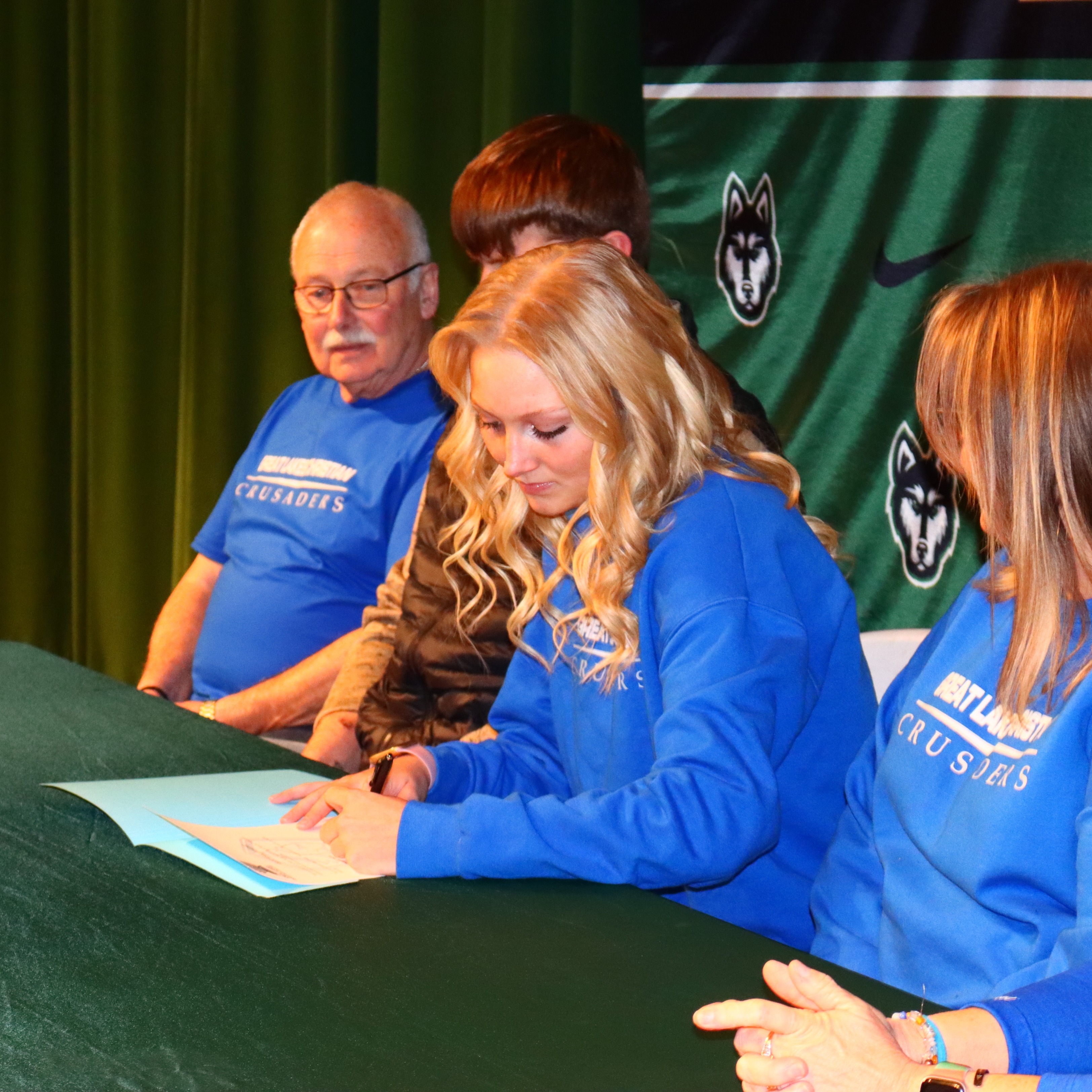 gracianne kinchen signs her letter of intent to play soccer at GLCC