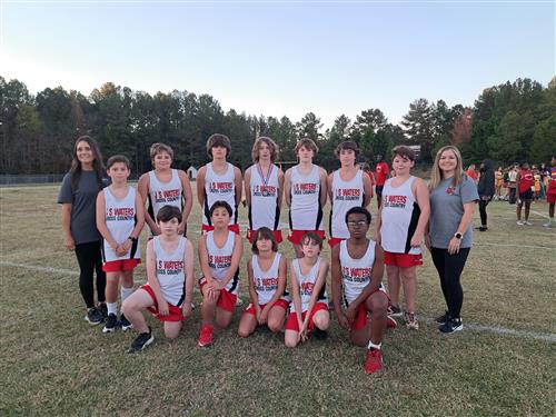 cross country team players picture and their coaches, they're outdoors