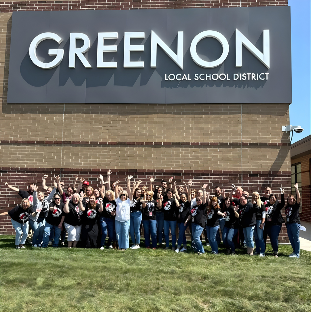teachers outside of the building