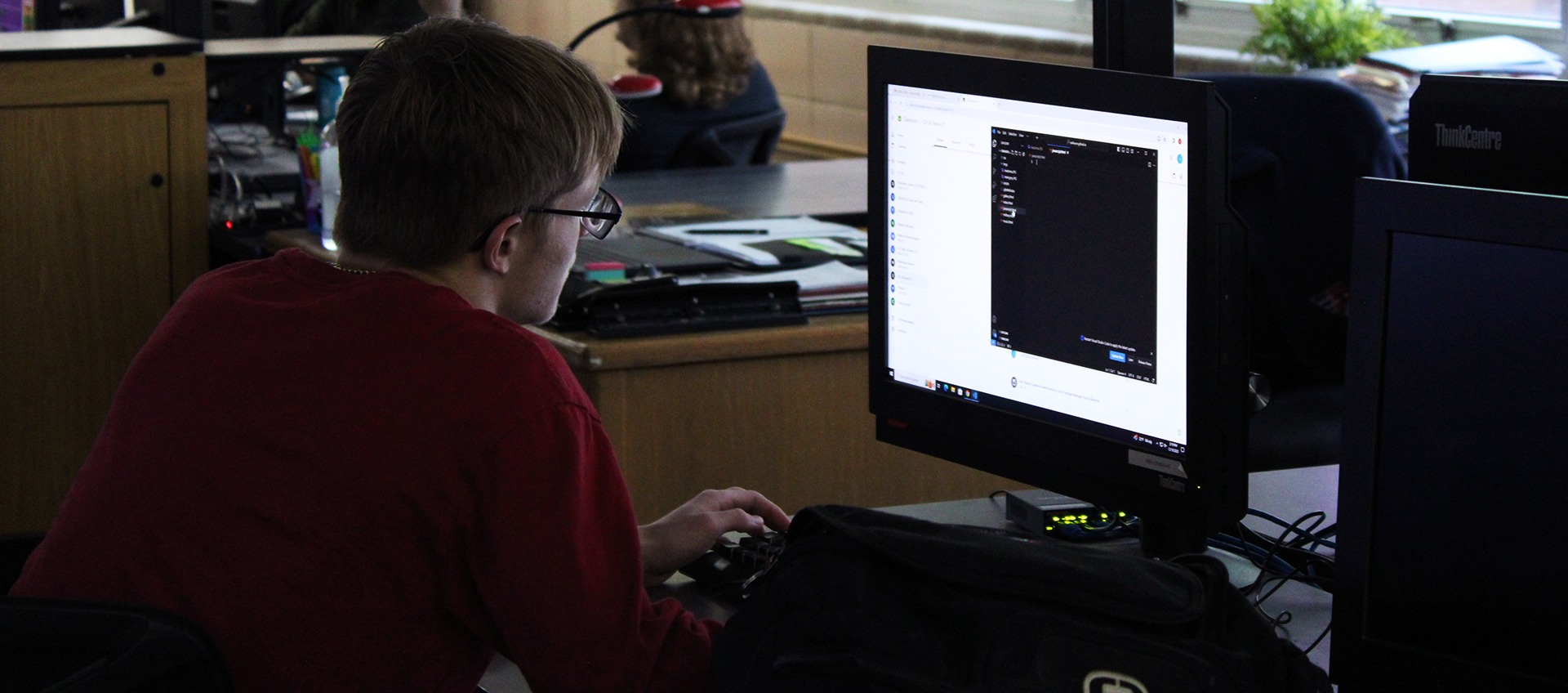 a student looking at his computer screen