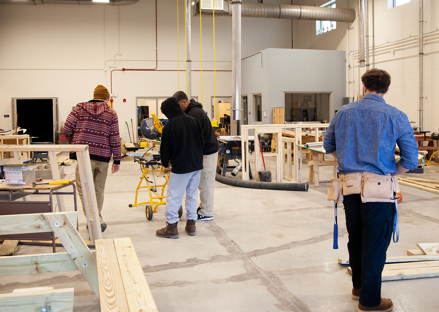 students working in side a construction lab