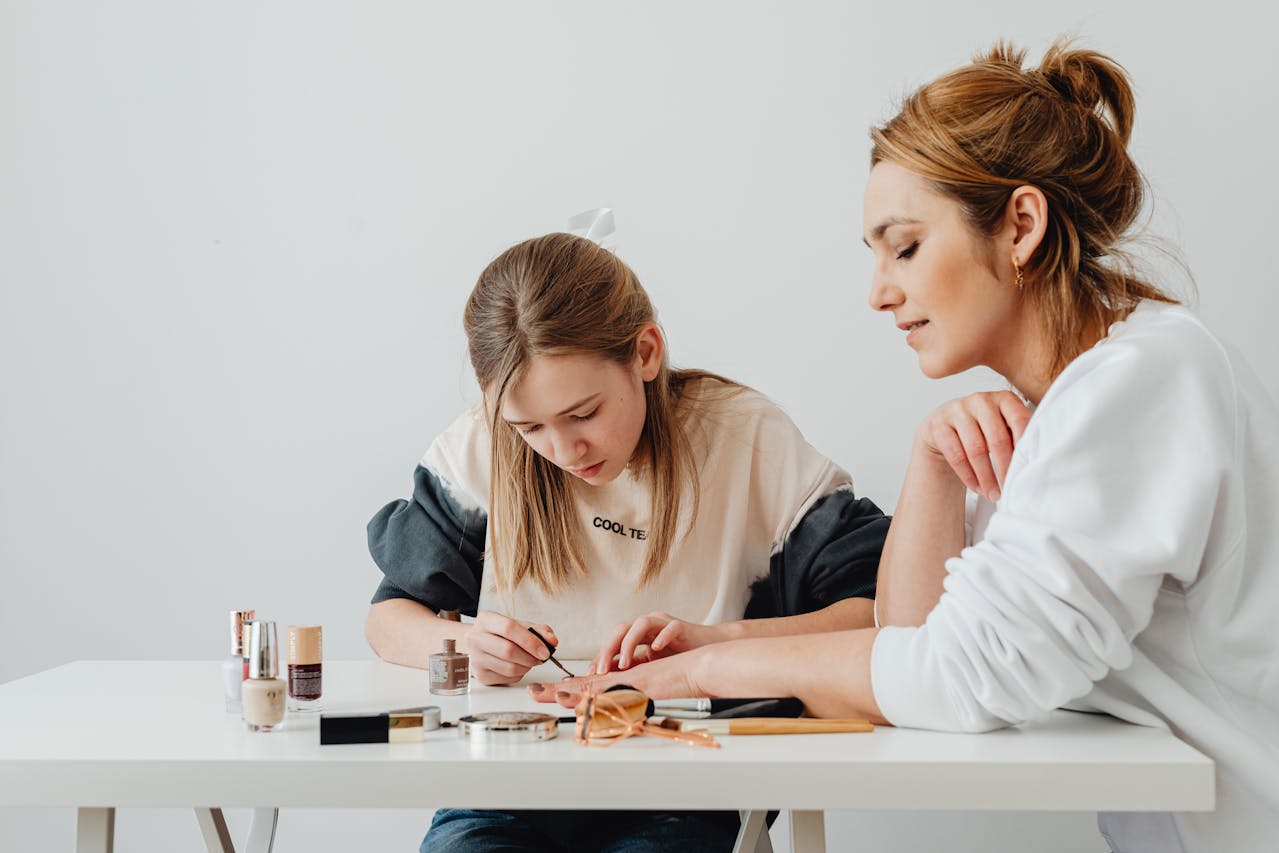 a parent helping her teen with school work