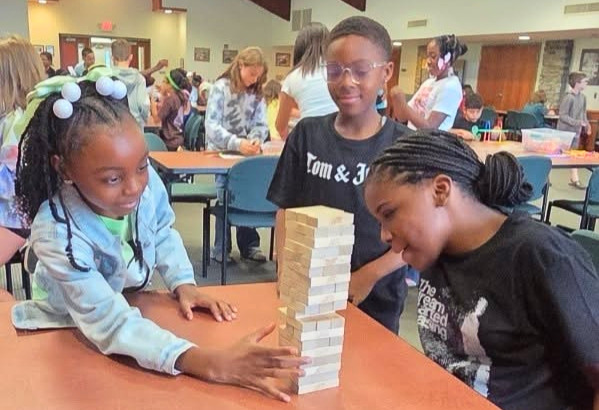 kids playing jenga