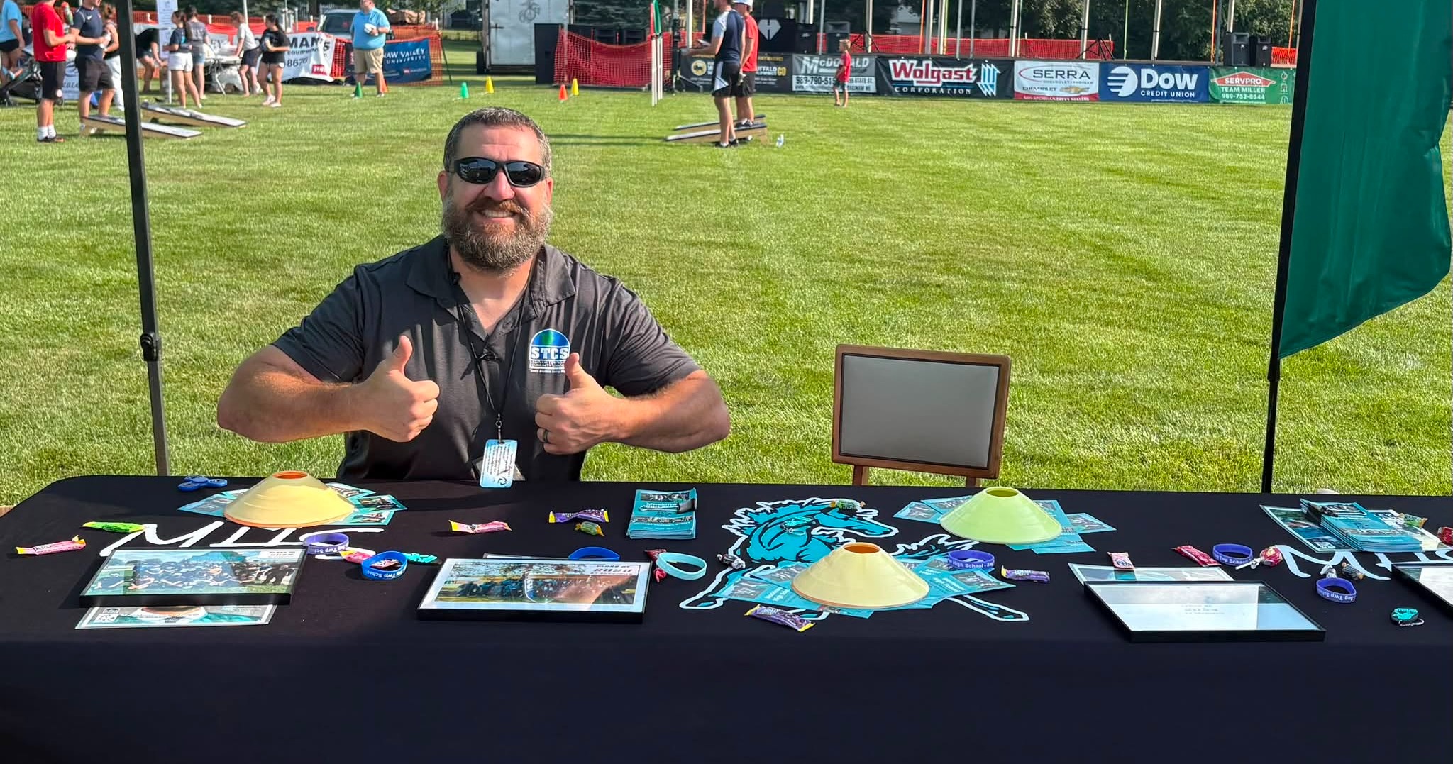 principal kern smiling at event table