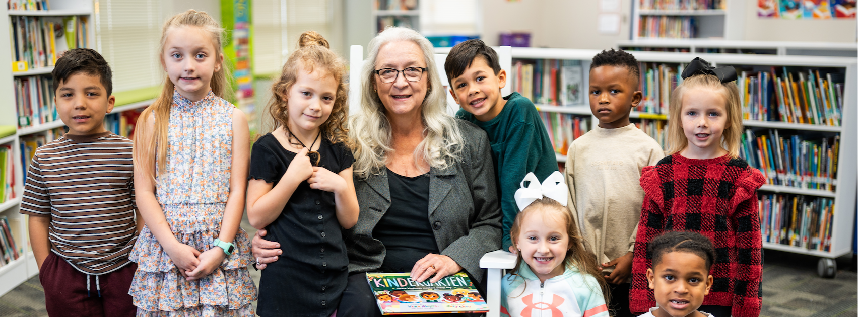 Paula Reading with Students