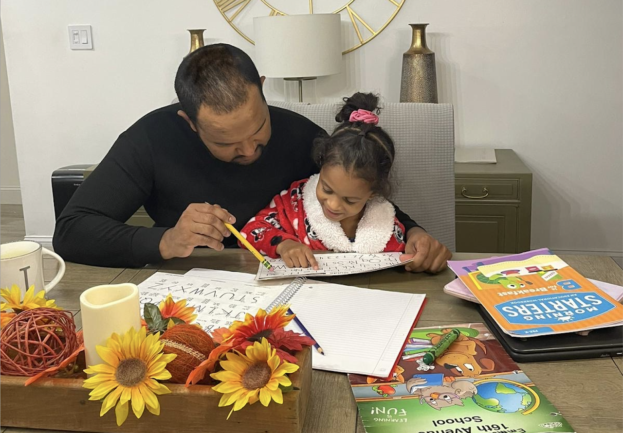 dad and girl learning