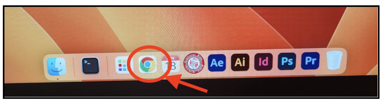 6. Find the dock at the bottom of the screen. Click and open Google Chrome. 