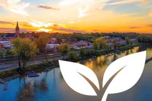 Image of Skyline of with logo text "grow washmo" as a tagline for comprehensive plan