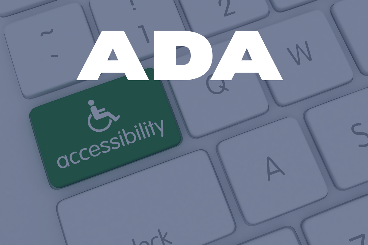 Keyboard with one green key that reads "accessibility" with text ADA