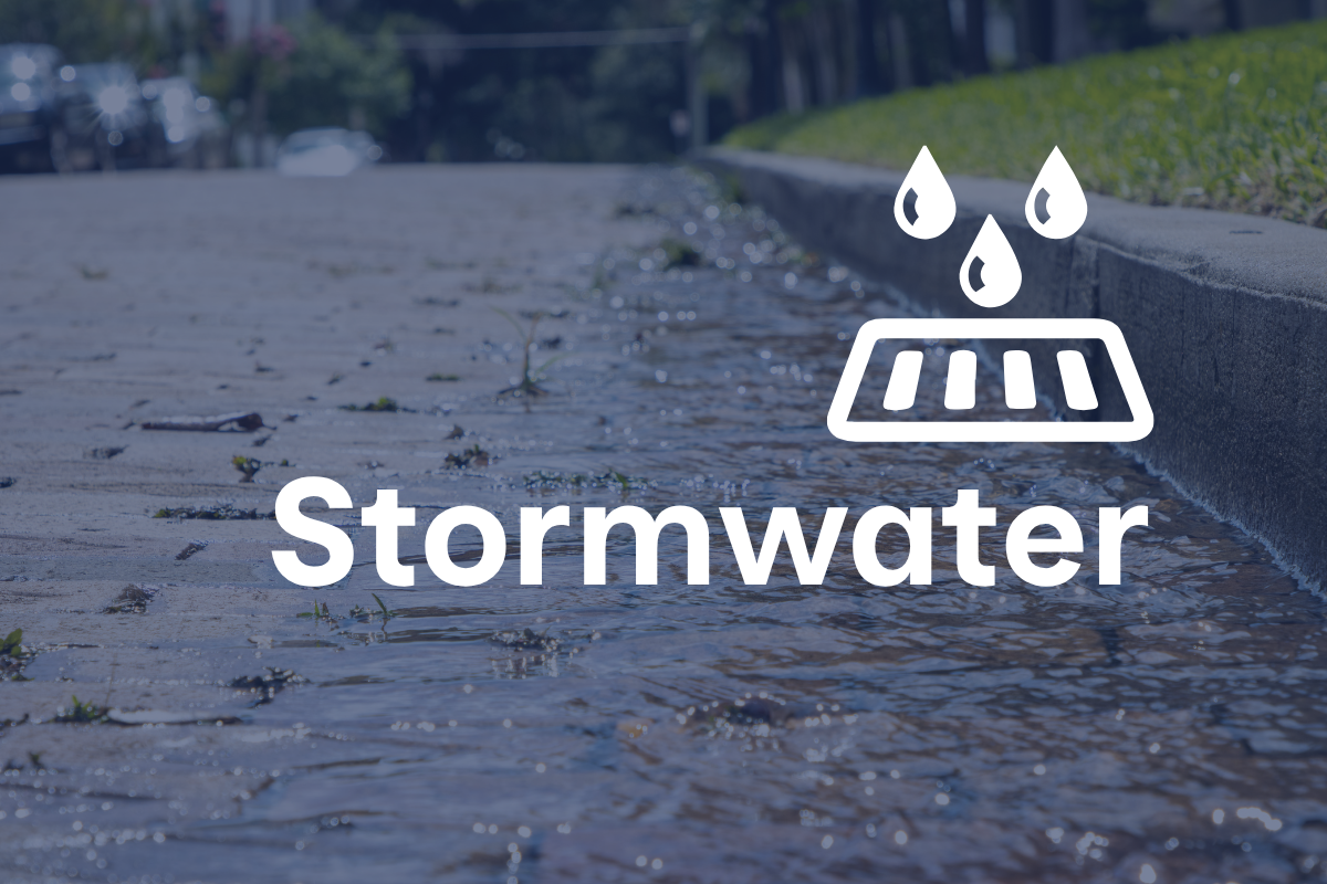 Water running down street with text reading Stormwater