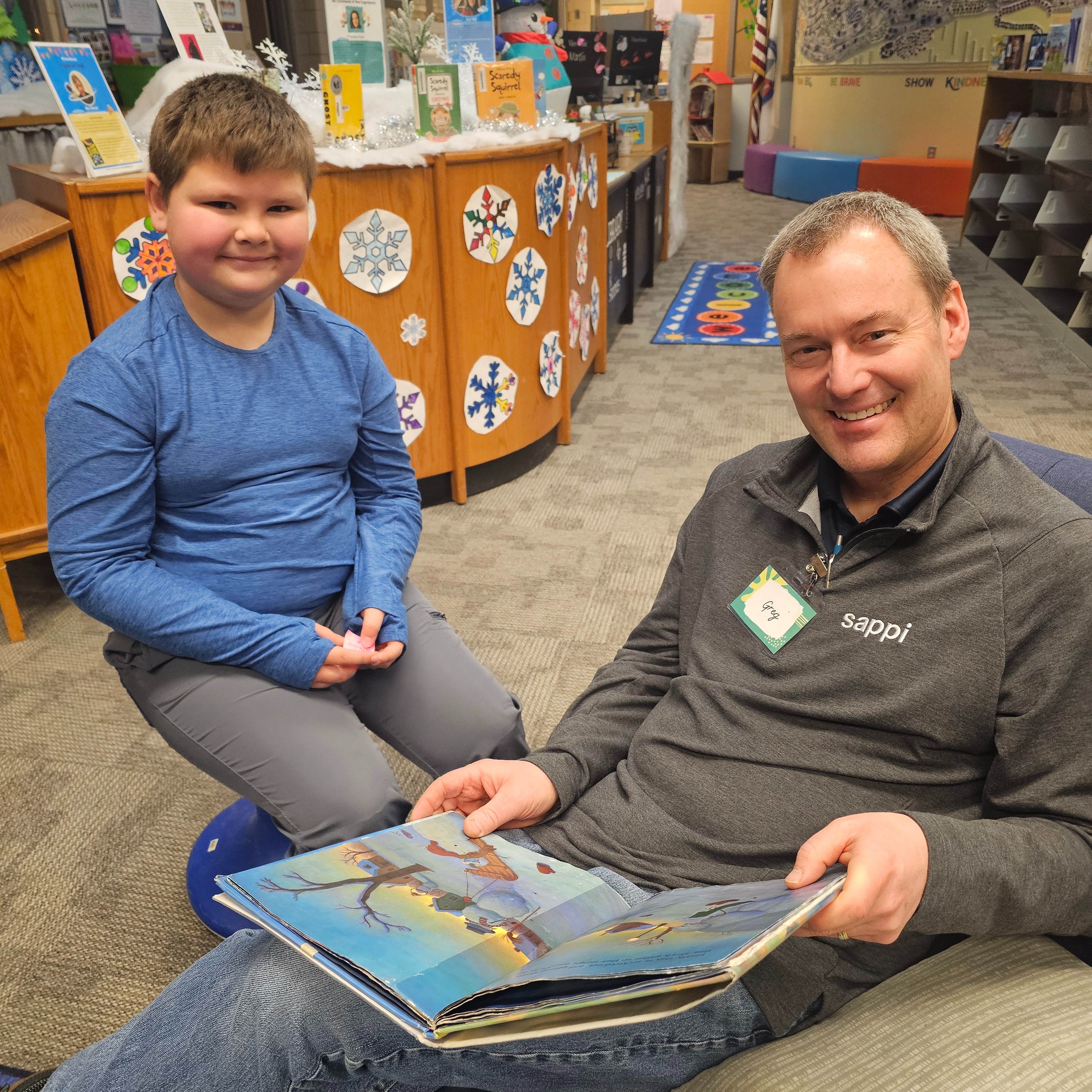 students and teacher reading