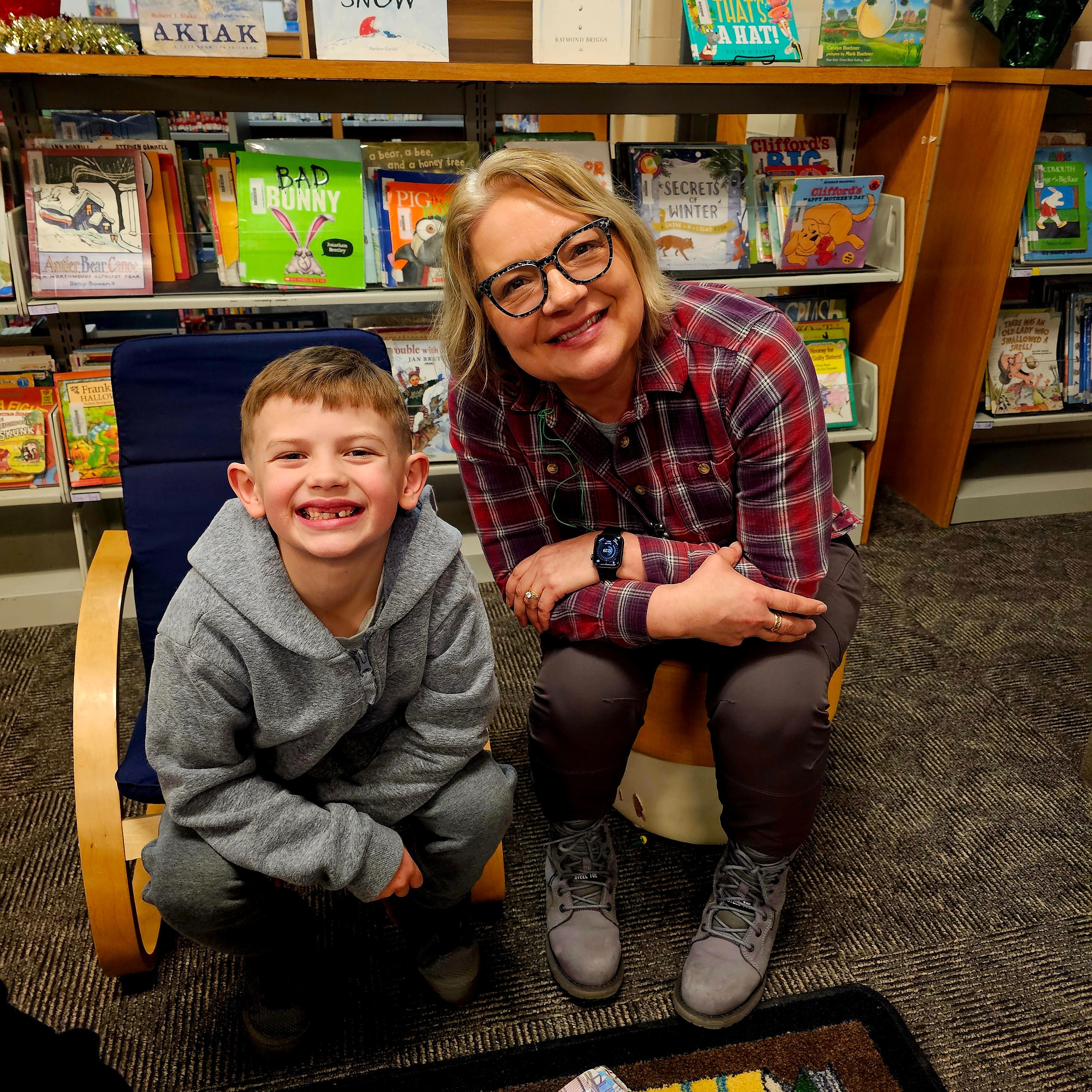 students and teacher reading