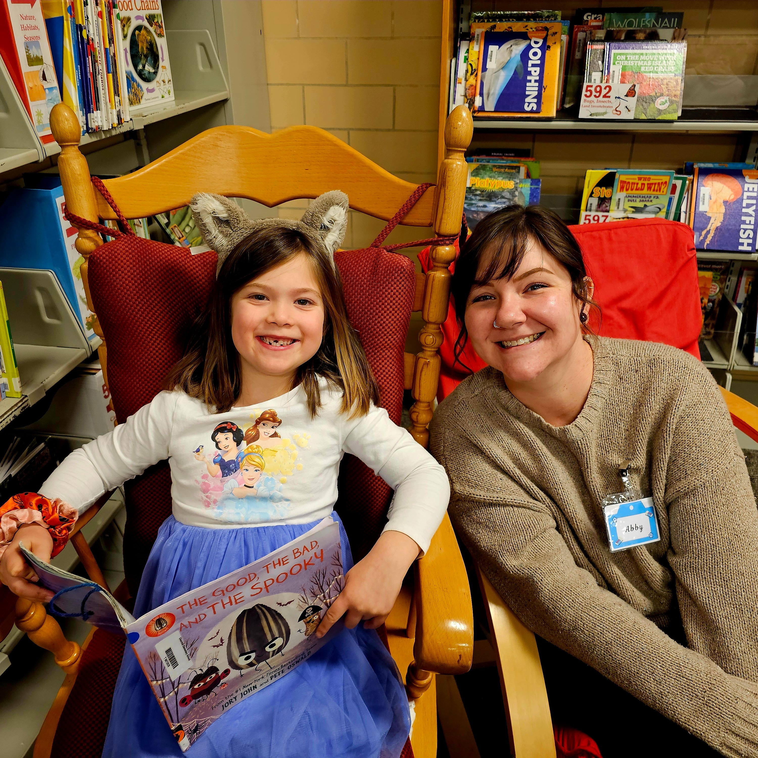 students and teacher reading