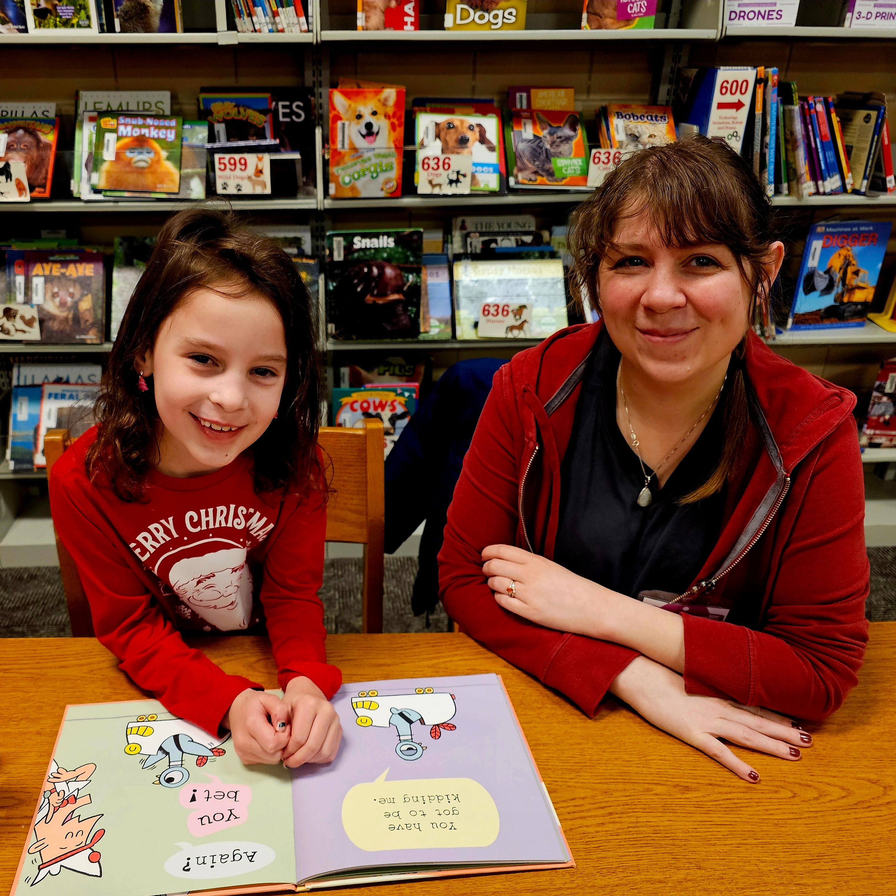 students and teacher reading