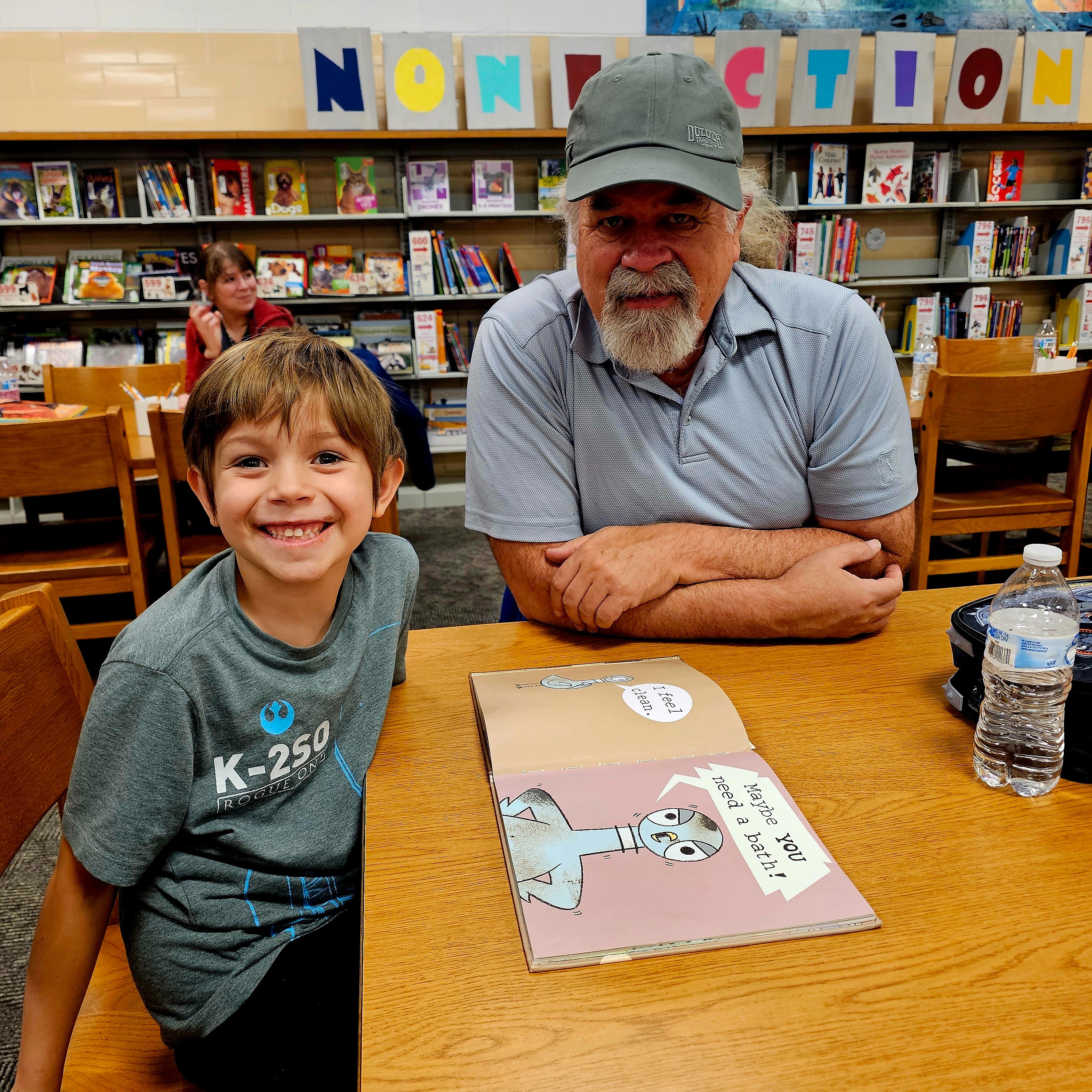 students and teacher reading
