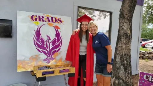 graduate and teacher