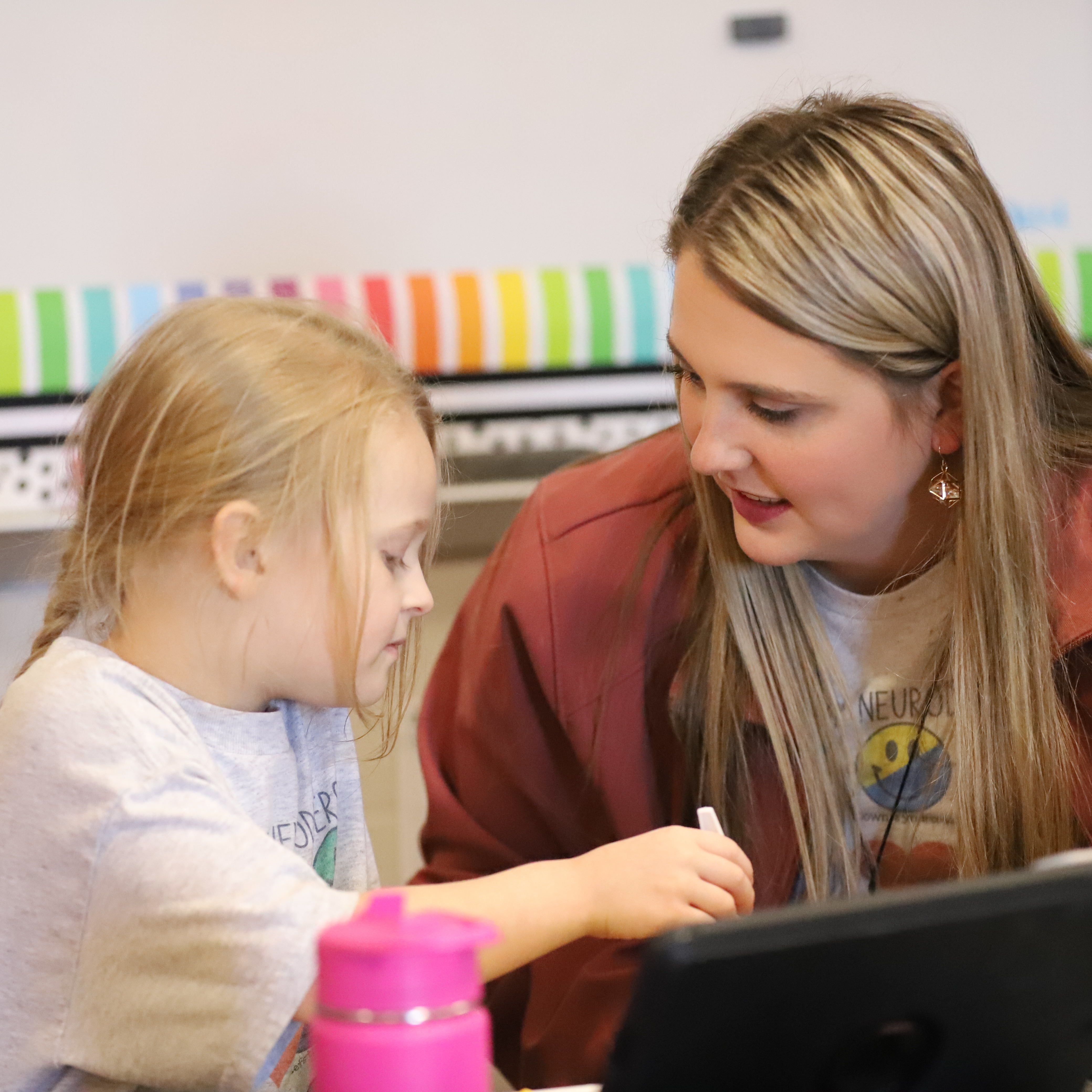 teacher talking to student