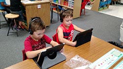 kids working with te computer