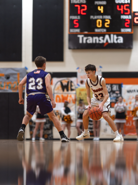 Napavine sophomore Eric Bullock dribbles the ball up the court at a home basketball game