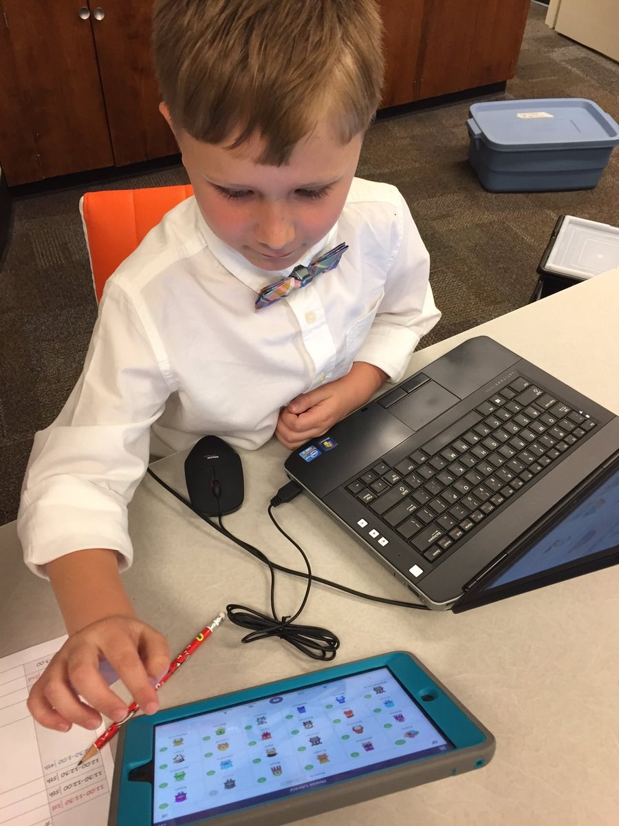 kid using tablet