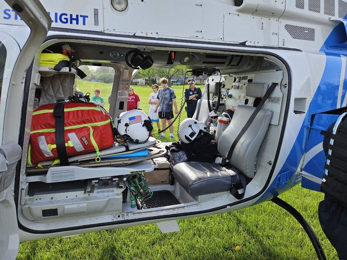 EMT Students with helicopter