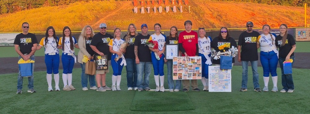 Softball Seniors pose with their families on Senior Night 2026