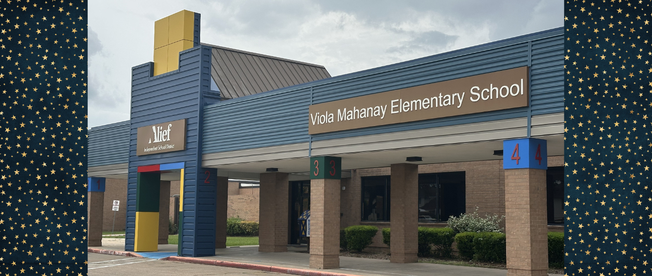 Exterior of Vou Mahany Elementary School, blue and yellow pillars, a green bush, and a cloudy sky.