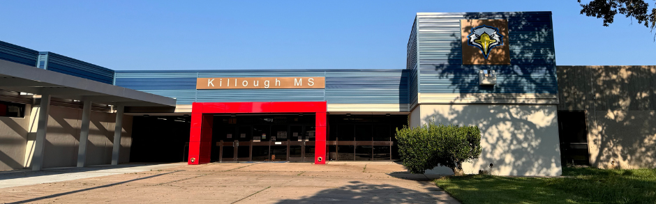 the front of a school building - red and white.