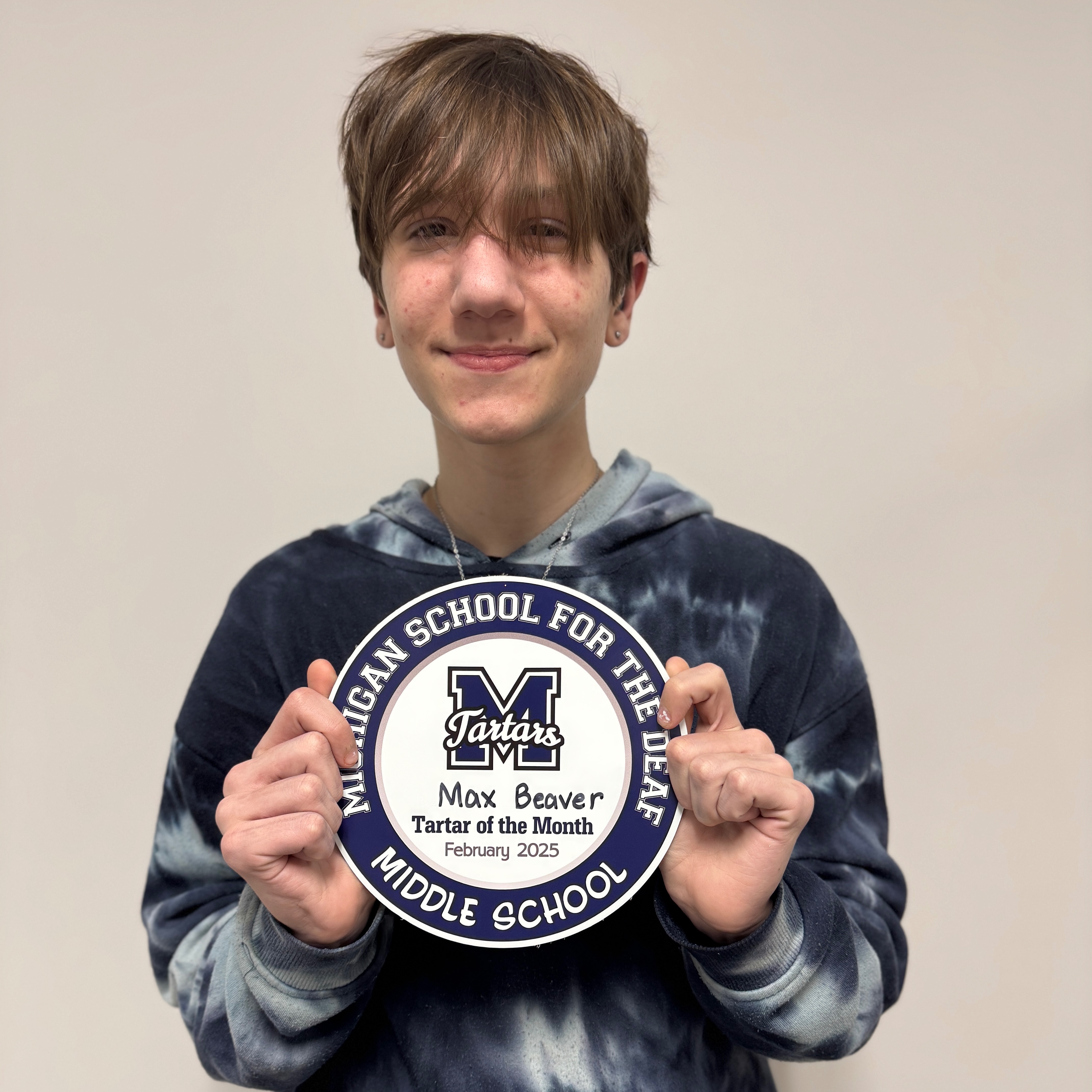 Max Beaver Holding Plaque