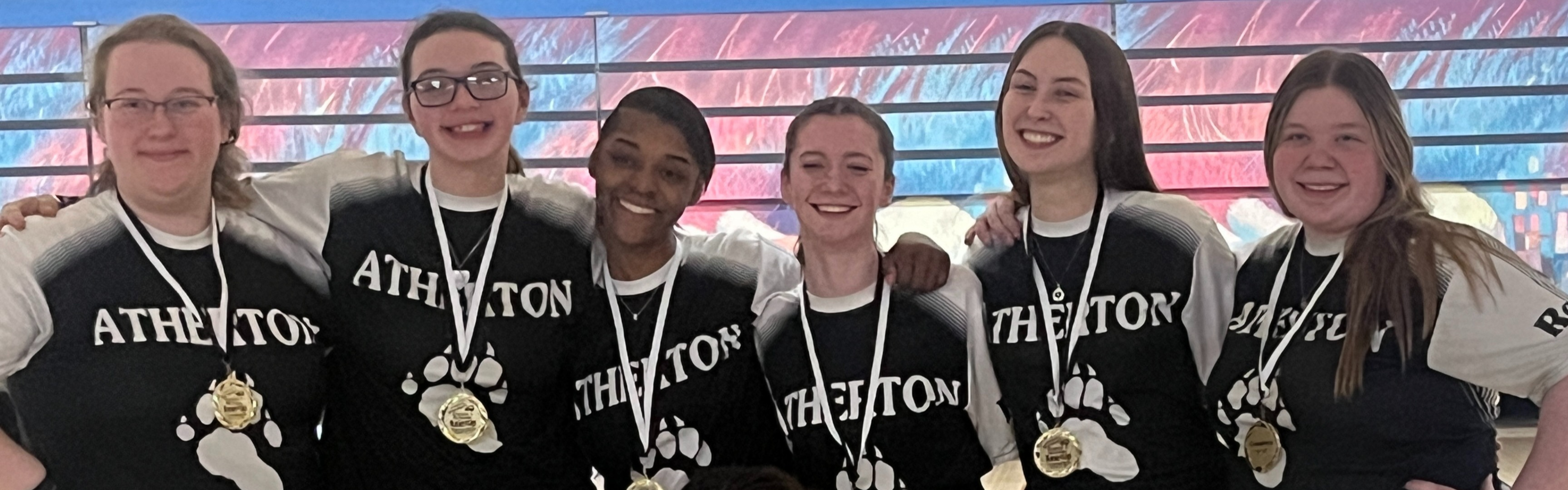 bowling team poses for photo